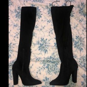 Thigh high black boots